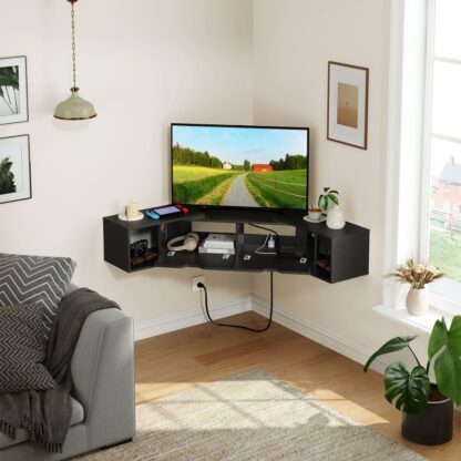 Đứng trước đó là giá đỡ TV với lối thoát năng lượng, Trung tâm giải trí có thể xoay màu đen, Trung tâm giải trí gắn trên tường với lưu trữ cho phòng khách, Dưới kệ TV